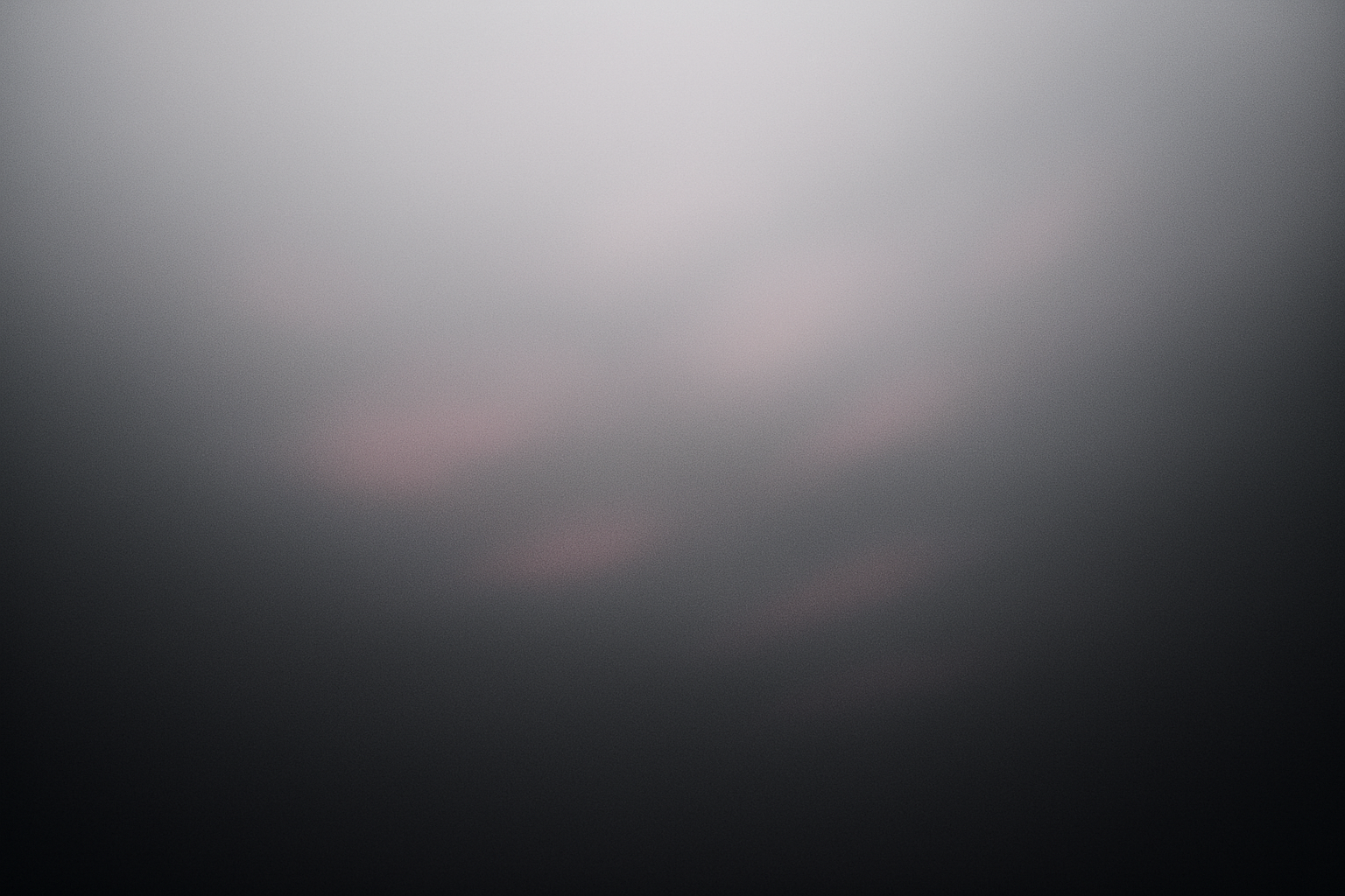 Black to gray gradient with a little bit of pink